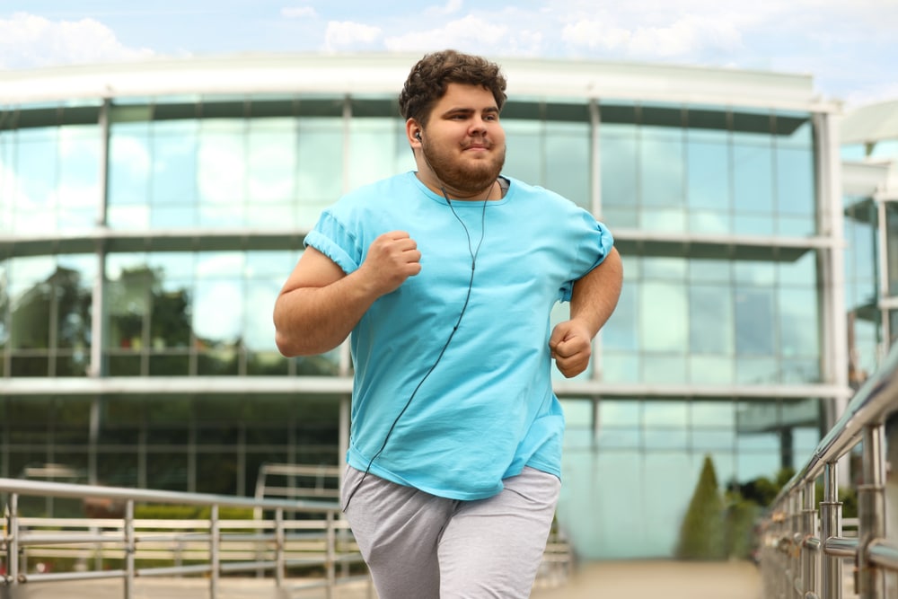Young,Overweight,Man,Running,Outdoors.,Fitness,Lifestyle Body Composition Analysis in Silver Spring